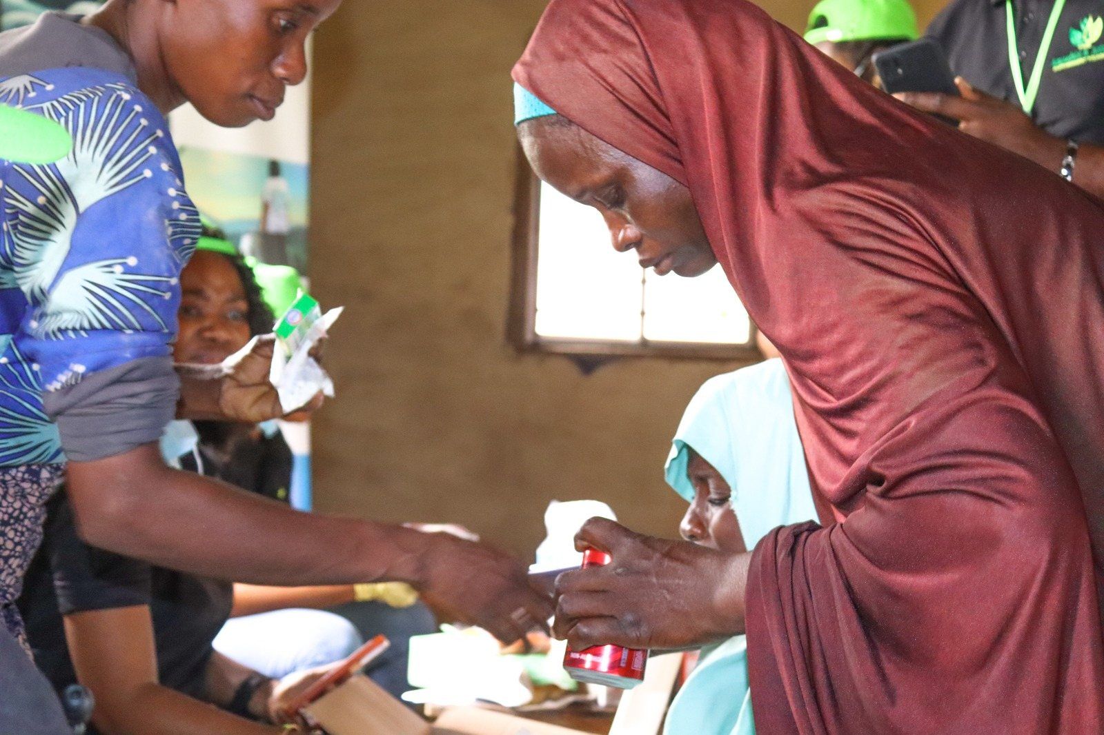 Food aid changes hands during the first outreach.