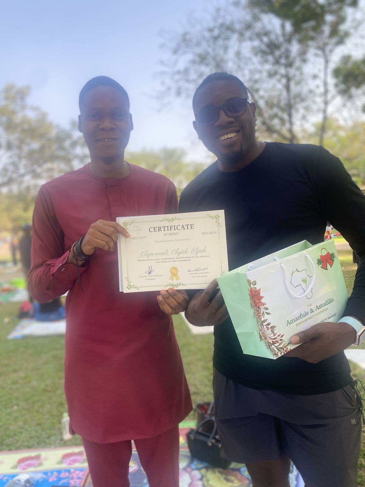 A volunteer receives an award certificate.